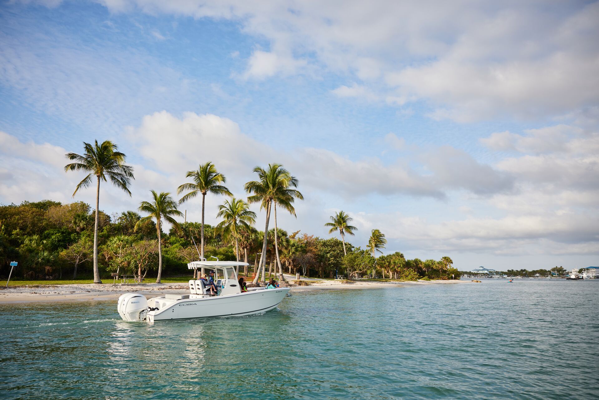 A boat on the water near shore.