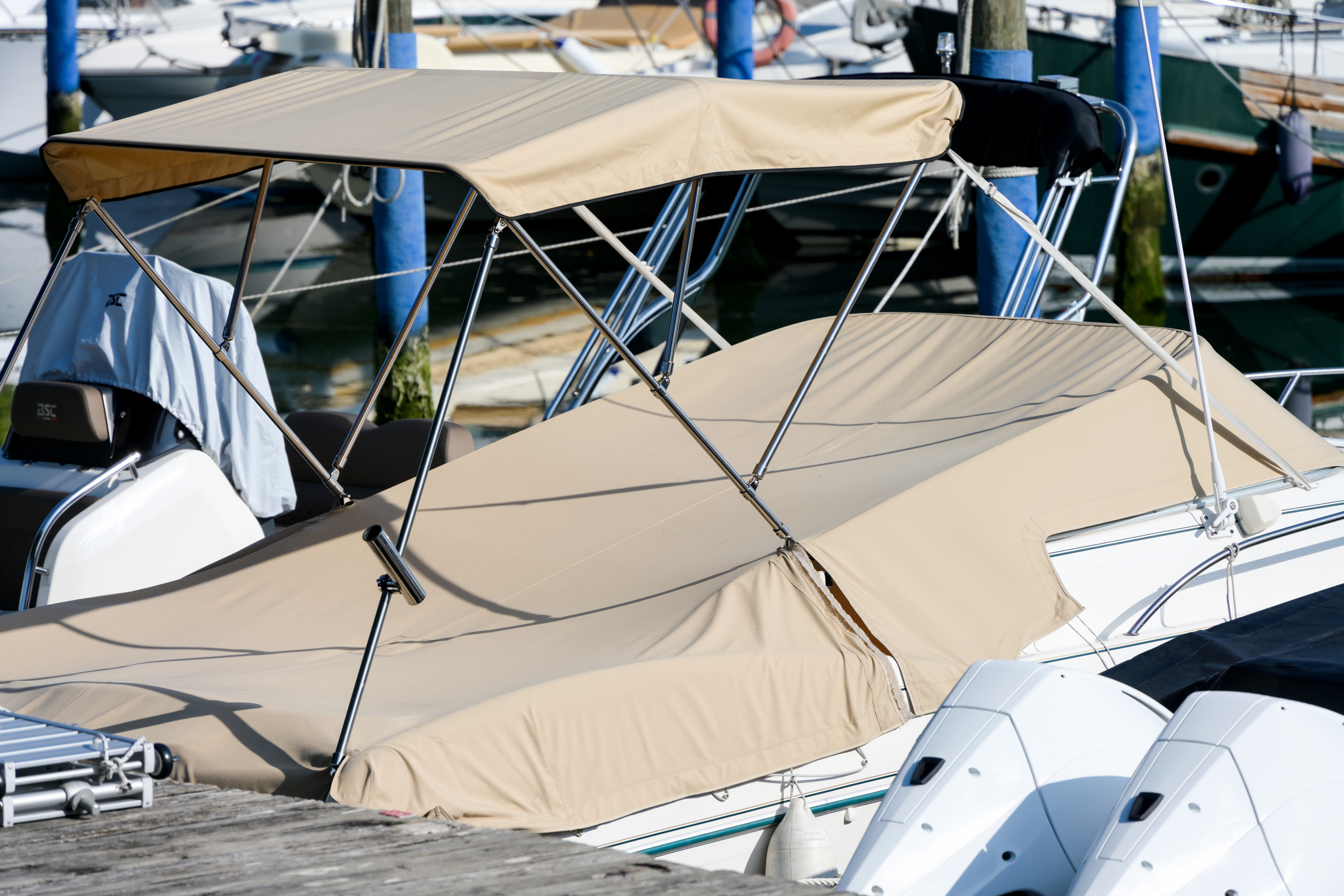 A boat covered at the dock as part of winterizing a boat this season. 