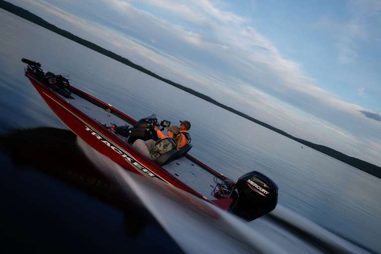 Two people in fast-moving fishing boat, how to operate fishing boats in bad weather concept. 