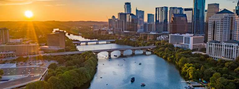 Wide view of a city on the water, best lakes for boating and water sports in Texas concept. 