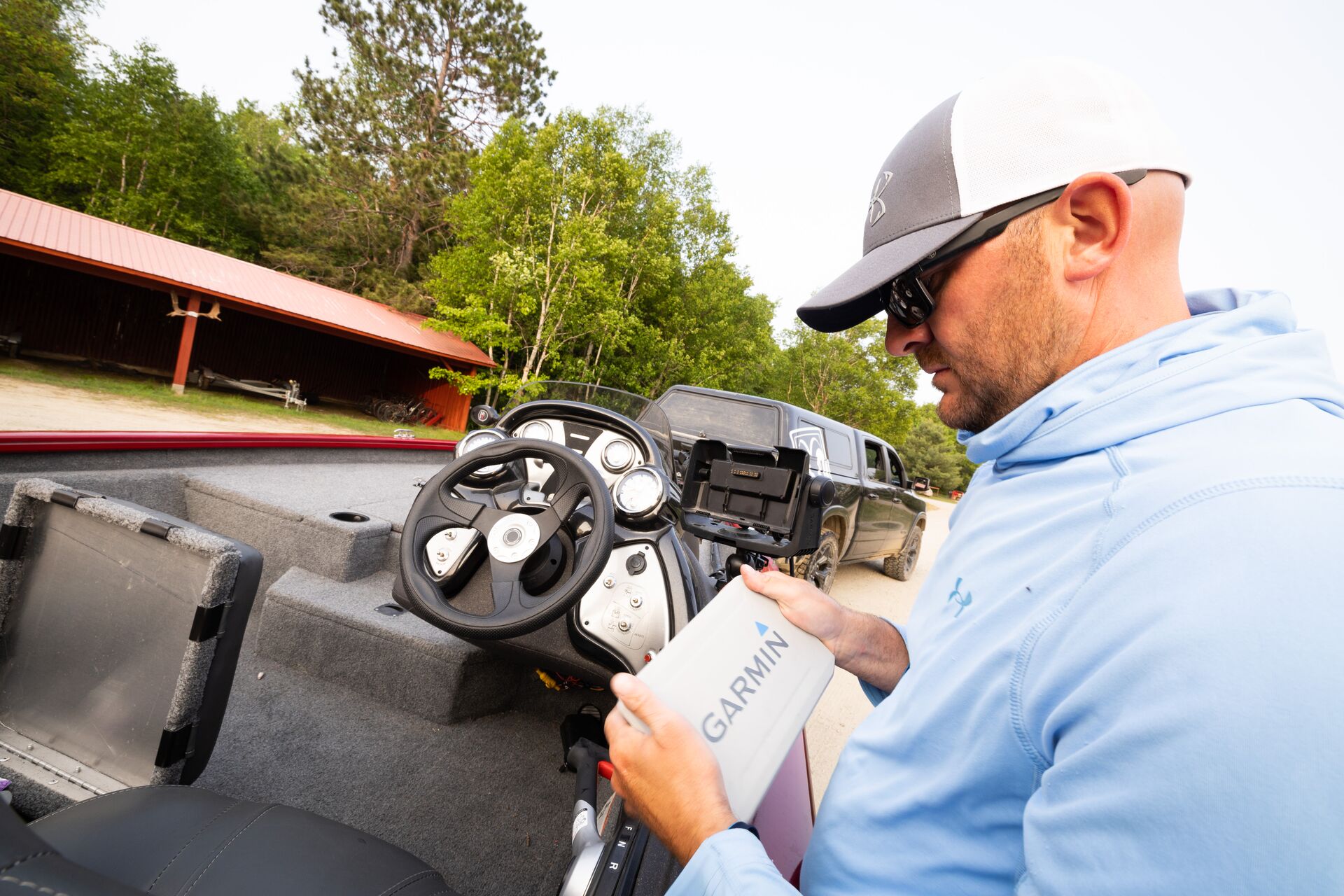 Boater with Garmin boat GPS. 