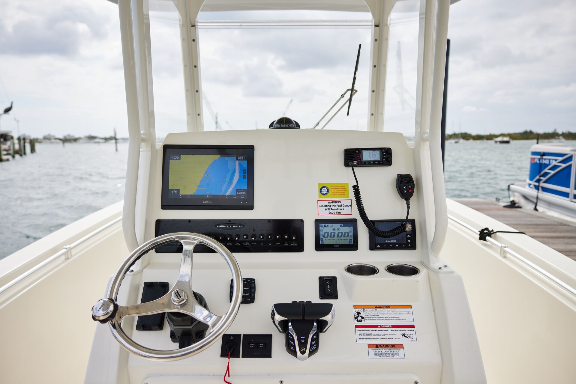The helm of a boat showing Boat GPS.