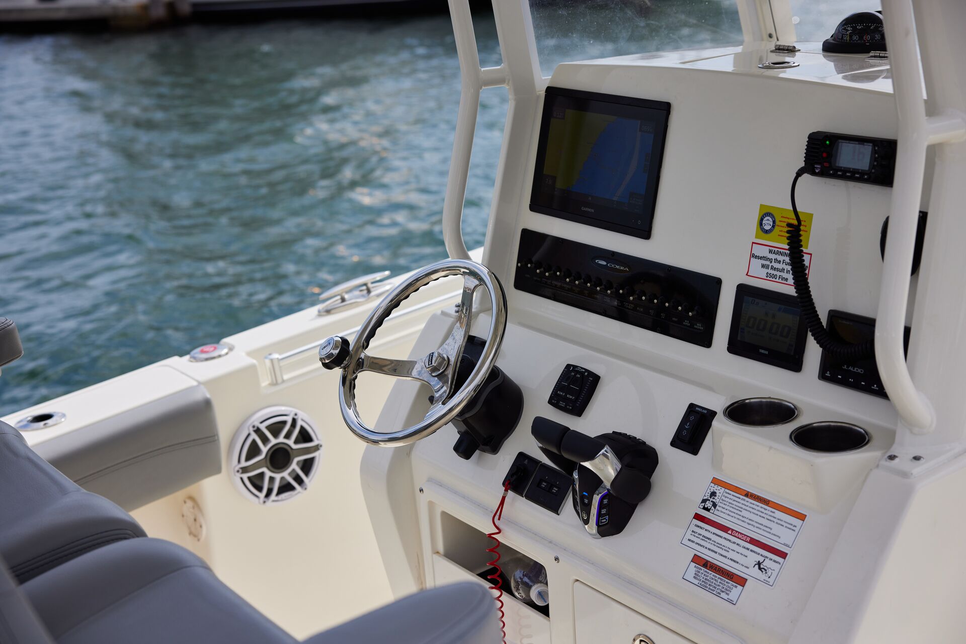 Close-up of the helm of a boat, how do i learn to drive a boat concept. 