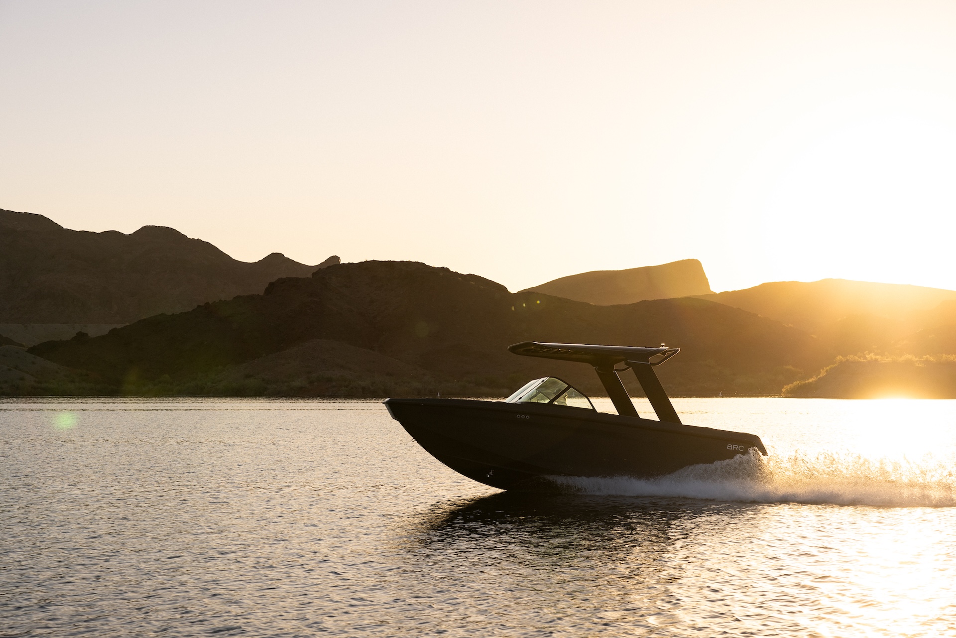 Electric boat on the water at sunrise, eco friendly boat concept. 